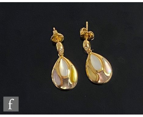 A pair of 18ct drop earrings each with three different coloured mother of pearl pear shaped panels suspended from a three sto