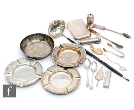 A small parcel lot of assorted hallmarked silver items, three ashtrays, flatware items, a toothpick holder, toddy ladle, ciga