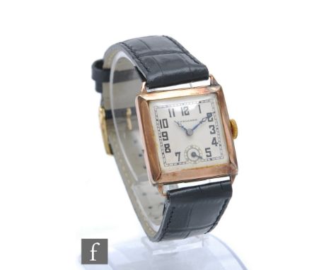 A 9ct hallmarked gentleman's Longines manual wristwatch, Arabic numerals to a square silvered dial, width 26mm, all to a blac