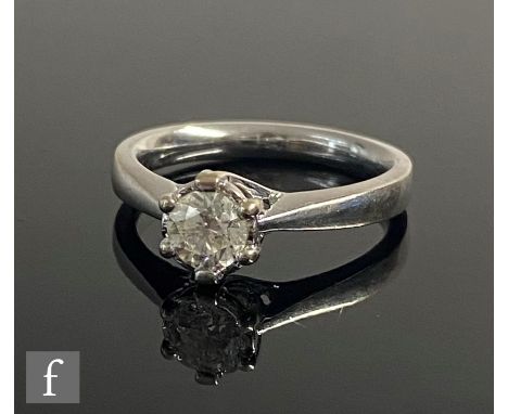 A modern 18ct hallmarked white gold diamond solitaire, claw set brilliant cut stone, weight 0.50ct, colour K/L, clarity SI 1,