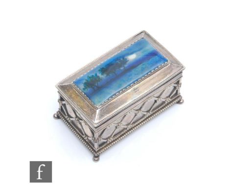 An early 20th Century Arts and Crafts jewellery casket, by Charles Fleetwood Varley for Liberty &amp; Co, the domed lid set w