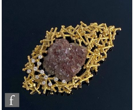 A mid 20th Century modern 18ct rough amethyst and diamond set brooch set to over lapping textured batons, total weight of dia