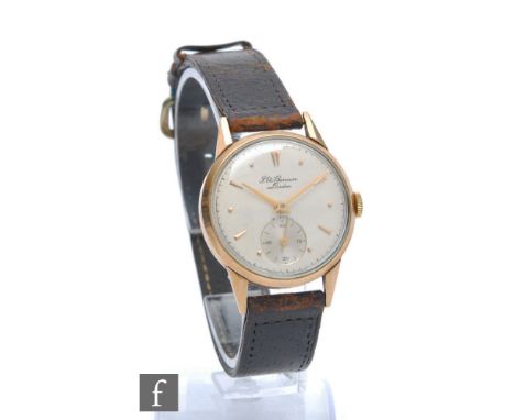 A gentleman's 9ct hallmarked J.W. Benson manual wristwatch, gilt batons to a circular silvered dial, case diameter 32mm, to a