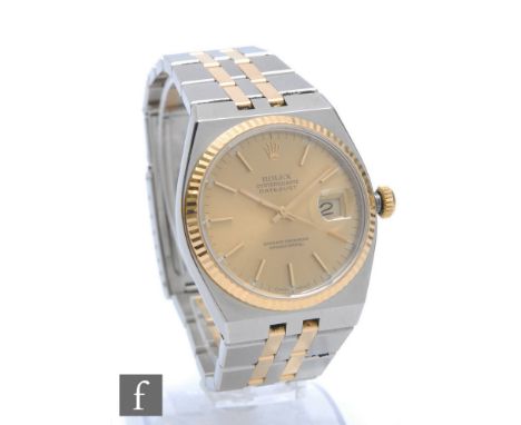 A gentleman's stainless steel and gold Rolex Oyster quartz Datejust wrist watch, gilt batons and date facility to a champagne