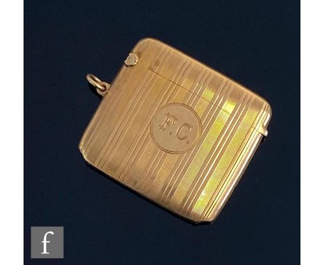 A 9ct hallmarked rectangular vesta case with initials F C within engine turned decoration, weight 26g, Birmingham 1925. 