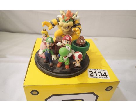 Nintendo boxed Super Mario figure group promotional item, H: 11 cm. P&amp;P Group 2 (£18+VAT for the first lot and £3+VAT for