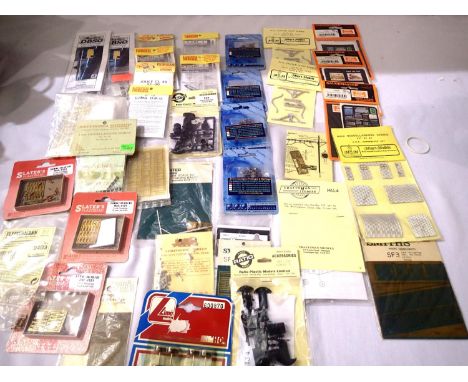 Quantity of OO scale accessories; signs, couplings, flush glazing, pick-ups, detail parts etc, mostly in packets. P&amp;P Gro