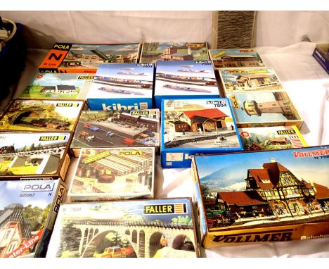 Seventeen N Gauge building kits, Faller, Pola, Kibri, Vollmer, all appear complete, some sealed. P&amp;P Group 2 (£18+VAT for