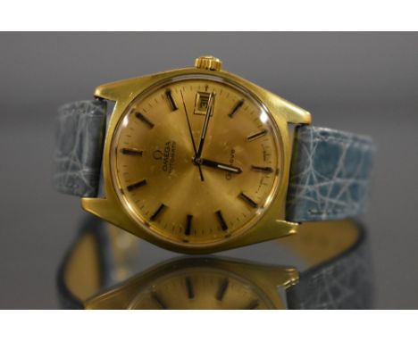 Omega  - an automatic Geneve wristwatch, gold coloured dial, arrow block baton markers, minute track, centre seconds, day ape
