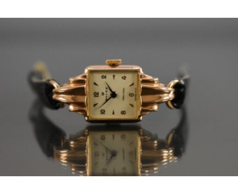 Rolex -  a vintager ladys Rolex Precision wristwatch, shaped multi layer case, rectangular textured cream dial, alternating A