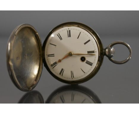 A George IV hallmarked silver full hunter pocket watch, white enamel dial, bold Roman numerals, minute track, spade hands, ve