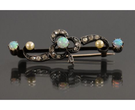 A 19th century diamond, opal and pearl brooch, inset with three circular opal doublets, two seed pearls and sixteen old rose 