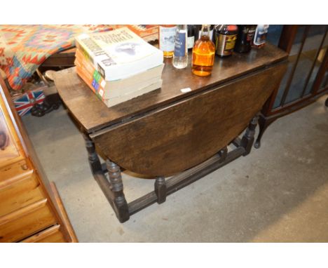 An 18th Century oak gate leg dining table