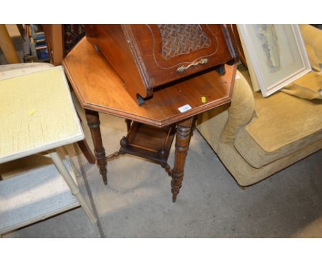 A mahogany window table raised on turned and ring supports