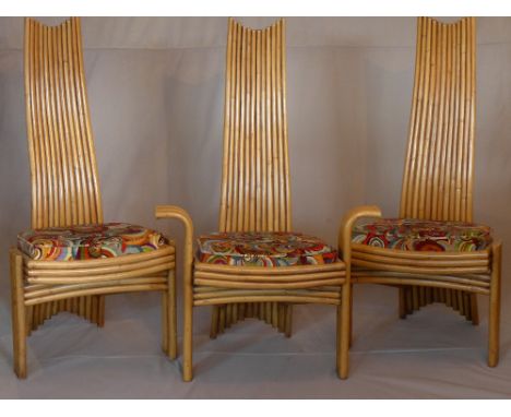A set of eight contemporary faux bamboo dining chairs, with abstract velour drop-in seats, bearing mother of pearl makers mar