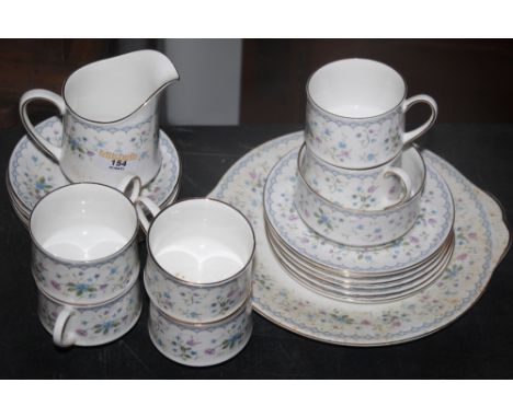 A Paragon bone china "Flora Bella" part tea service, comprising six tea cups, six saucers, milk jug, sugar basin, six tea pla