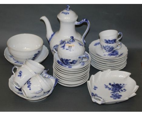 A Royal Copenhagen porcelain coffee service decorated with flowers on spiralled and trellis pattern white grounds, comprising