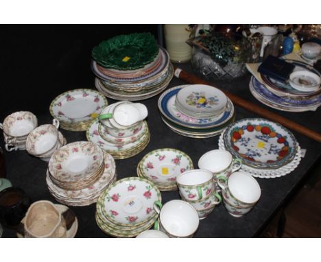 An Aynsley pottery rose spray part tea service (35 pieces), a Royal Doulton rose spray part tea service, comprising six tea c