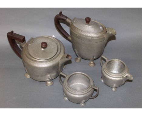 An early 20th century Tudor style pewter two handled tazza, 30 cm diameter, No. 018018 (extensively dented and misshapen) and
