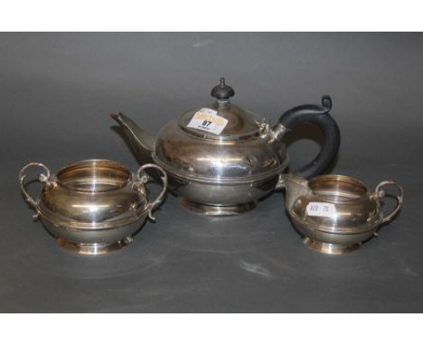 A George V bachelors silver three piece tea service with girdled bulbous bodies, Birmingham 1922, gross weight 496 grams (Tea