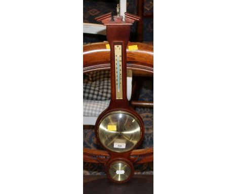 A modern Clevedon weather master mahogany wheel pattern thermometer, 56 cm high (lacking cover to thermometer section)
