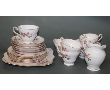A Tuscan bone china "Wood Sorrel" part tea service, comprising six tea cups, six saucers, milk jug, sugar basin, six tea plat