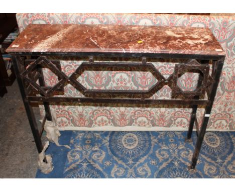 An oblong rouge variegated marble topped iron garden console table, with geometric decoration, 97 cm x 115 cm x 35 cm