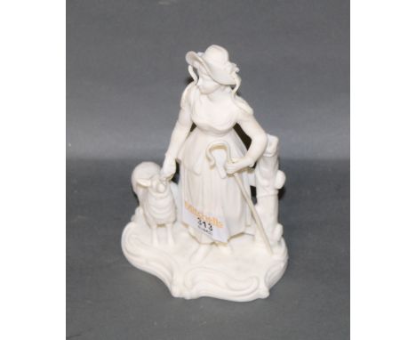 A Continental bisque porcelain figure group of a young shepherdess and sheep, 18 cm   