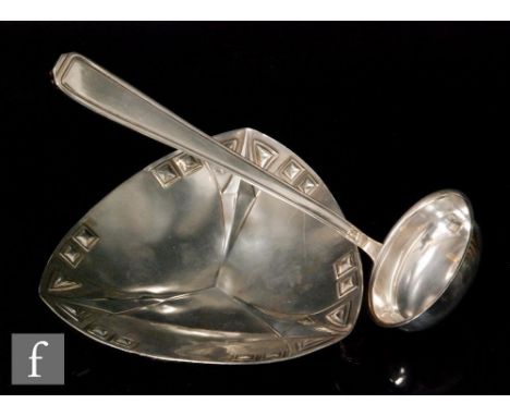 An early 20th Century WMF pewter dish of triform with a repeat stepped block and triangle pattern to the rim, faint marks to 