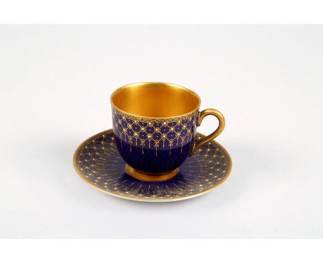Eight piece Royal Worcester Coffee set, dark blue ground with gilt decoration, dated coded 19922/23 (four cups and four sauce