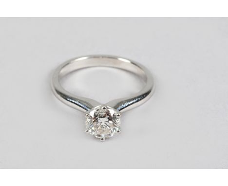 18 carat gold diamond solitaire ring, .75 carat brilliant cut diamond, white gold shank by Michael Hill 