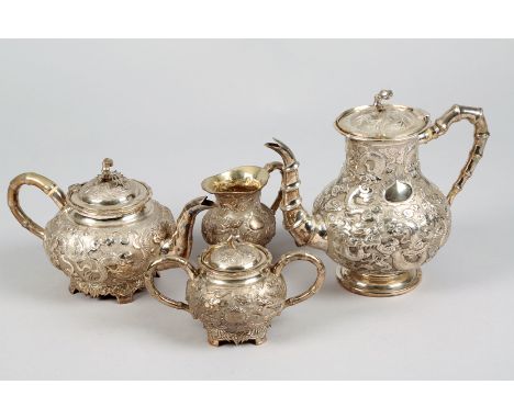 Late 19th Century Chinese four piece silver coffee and tea service, ‘Bamboo’ shoots handles and finials and decorated with dr