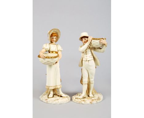 Pair Worcester figures of a young man and lady both holding large baskets, standing on naturalistic bases with tree trunk spi