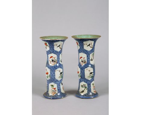 Pair 19th Century Chinese vases of flared form, blue scroll ground with white panels decorated with birds in flowering trees,