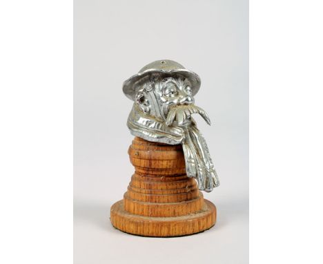 Bruce Bairnfather ‘Old Bill’ alloy metal car mascot, mounted to an oak plinth, signed to helmet. 15cm high (including plinth)