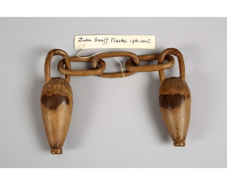 Pair African Zulu snuff flasks, carved from hardwood and united by three carve links, each flask approx. 8.5cm long 