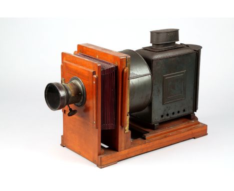 19th Century Magic Lantern, on a mahogany mount with mahogany and red bellows with a fixed brass lens, gas fittings, mahogany