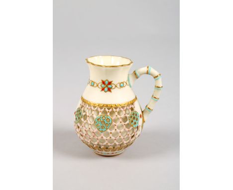 Royal Worcester, Kerr & Binns Period, reticulated cream jug, decorated with blue and pink enamels. 105cm high 