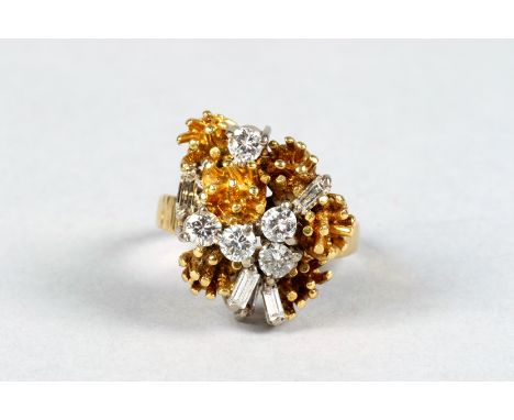 Ladies 18 carat gold diamond ring, with five set brilliant cut diamonds, and five bagette cut diamonds 