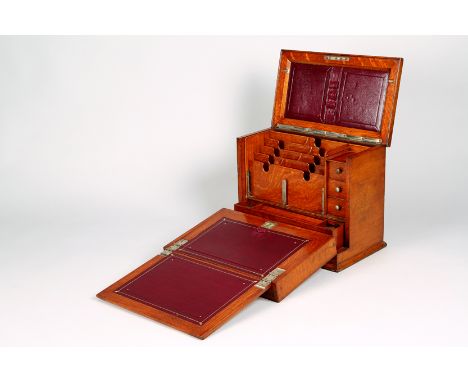 Edwardian light oak stationery and writing box, hinged cover revealing a fitted stationery compartment with a deep front and 