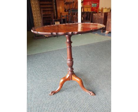 An Edwardian Mahogany Pie Crust Snap Top Tripod Table on Vase Support with Claw and Ball Feet. 82cm Diameter. Label for Baker