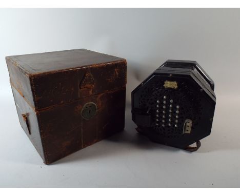 A Leather Cased Ebonised 48 Button Concertina by C.Wheatstone+Co, London. No 28318