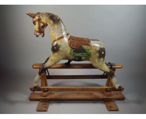 A Small Edwardian Dappled Grey Rocking Horse with Leather Harness and Saddle. on Pine Base. In Need of Cosmetic Repair. Horse