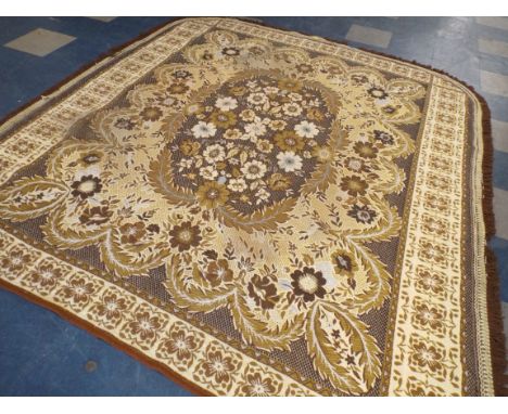 A Vintage Patterned Bed Spread with Cream, Brown and Pale Blue Wools and Brown Fringing. 217 Cm x 200 Cm. 