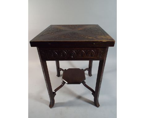 A Late 19th Century Carved Oak Envelope Games Table with Beize Playing Surface and Four Coin Wells. Single Drawer and Stretch