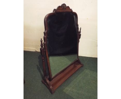 An Edwardian Mahogany Swing Toilet Mirror with Shell Moulding and Base Stretcher Shelf. 85cm High