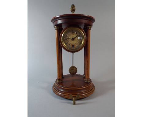 A Pretty French Walnut Portico Mantel Clock with Enamel Dial and Decorated with Painted Floral Swags, Circular Plinth Base an