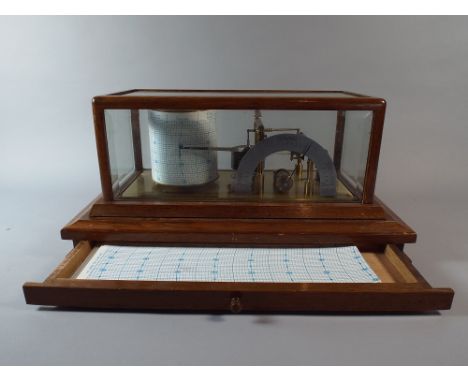 A Cased Barograph by Negretti and Zambra "The Regent Barograph" Number R/41147. On Plinth Base with Drawer Containing Unused 