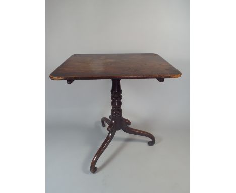 A Mid 19th Century Mahogany Rectangular Topped Tripod Table with Scrolled Feet. 65x50cm