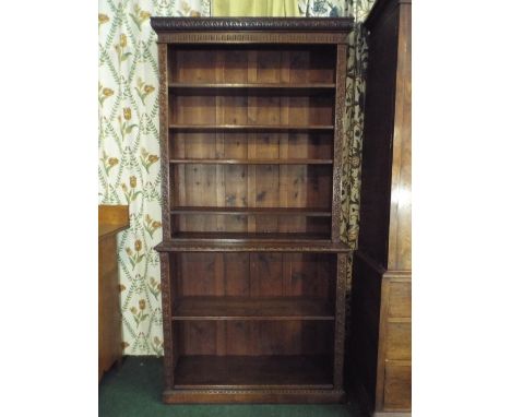 A Late 19th Century Oak Bookcase. The Base Section with Single Adjustable Shelf. The Upper Tier with Four Adjustable Shelves.